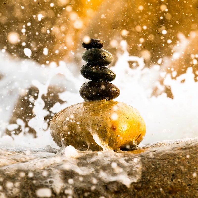 Foto de piedras y agua meditación NeuroTree and Care